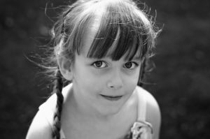 Black and white portrait of little girl