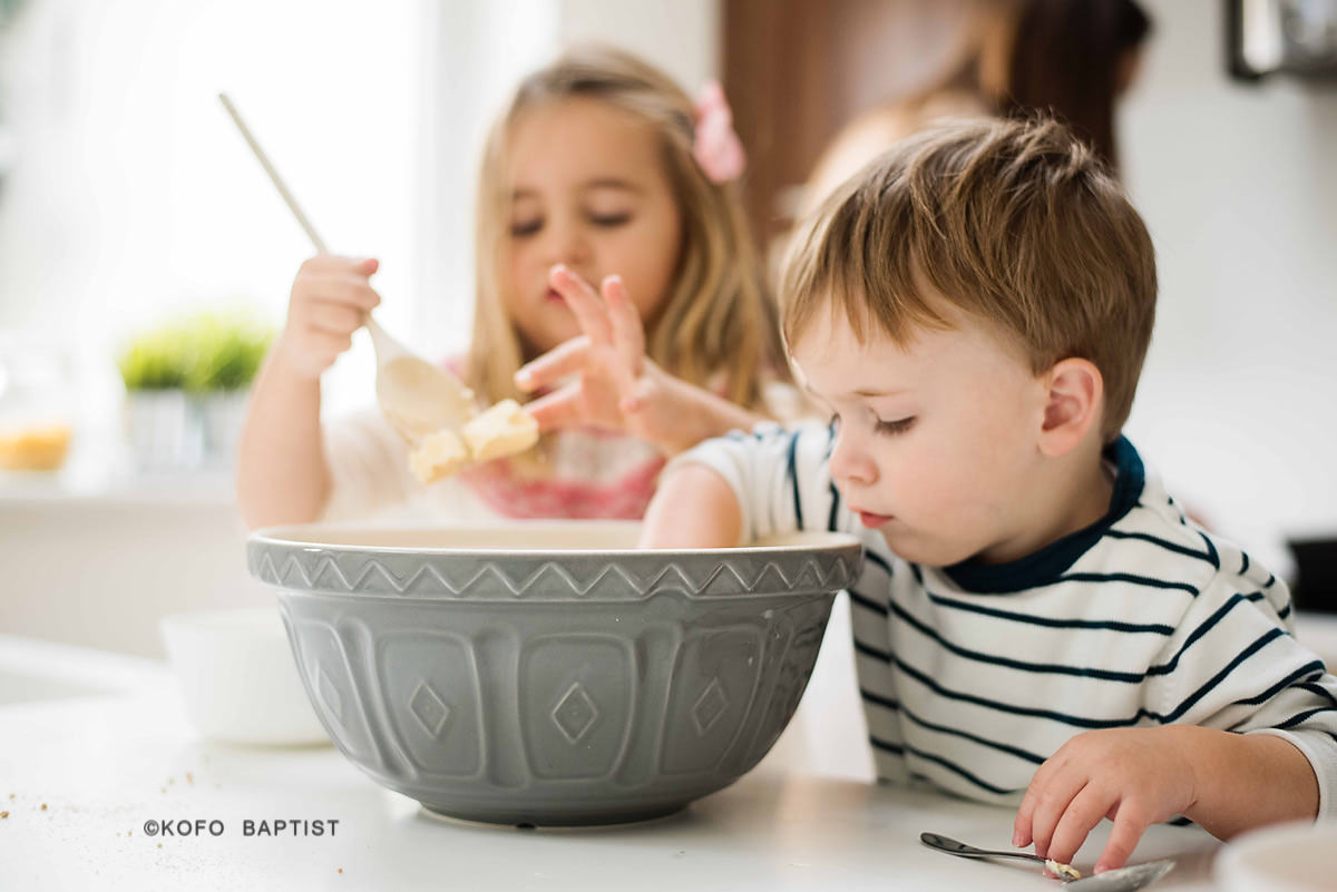 Brother and sister baking cookies