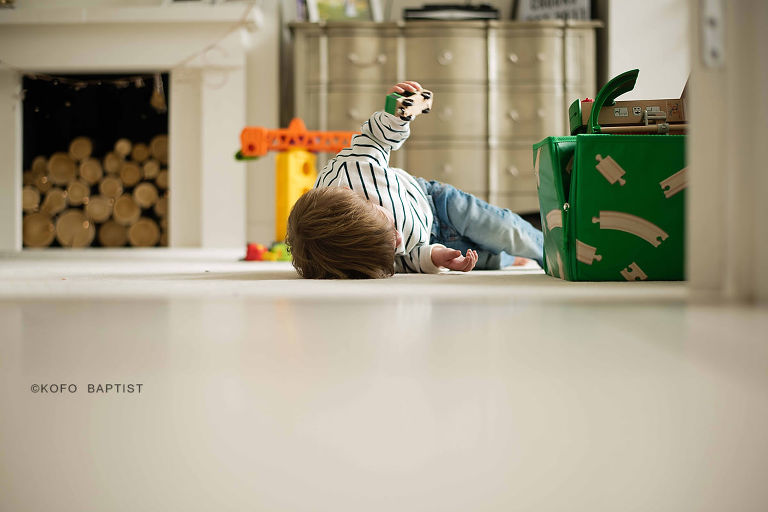 Toddler sulking on the floor
