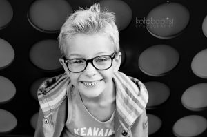 Young boy wearing sunglasses