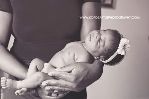 Newborn baby in mummy's arms