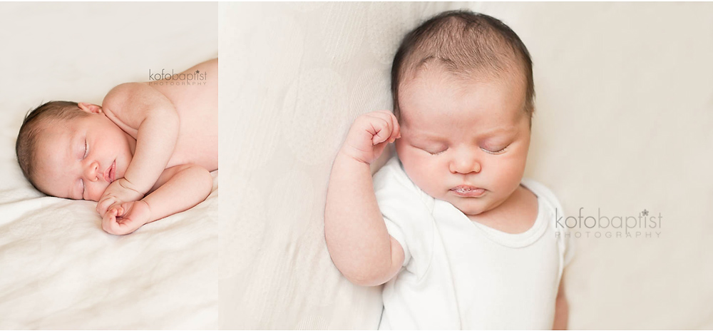Newborn baby boy on cot bed.