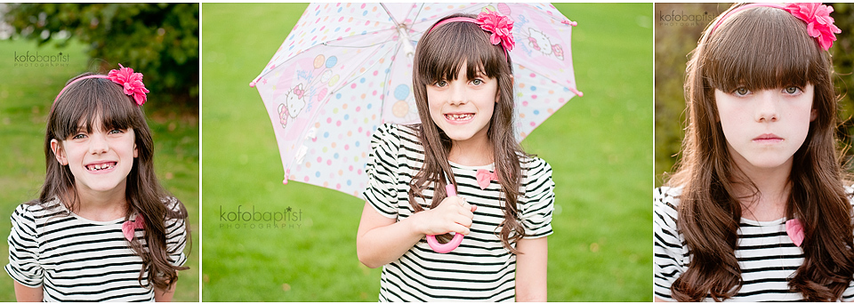 Young girl holding an umbrella by Colchester Essex Child Photographer Kofo Baptist